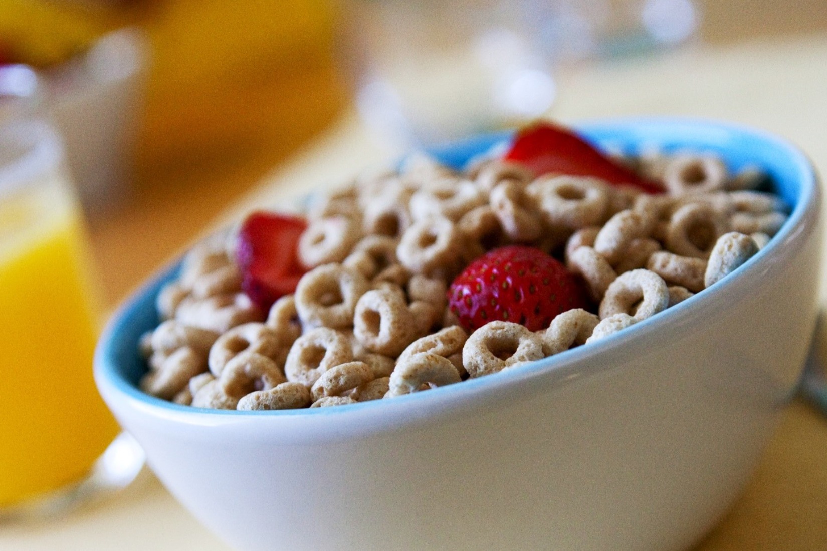 Bowl of Cheerios with strawberries